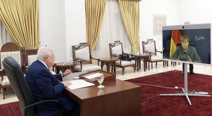 عباس وميركل